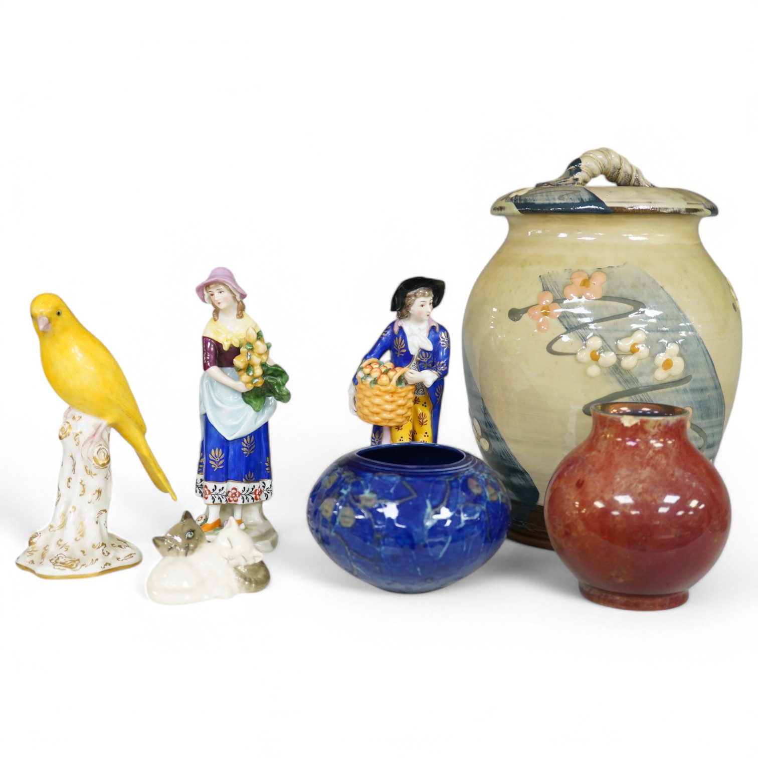 A Royal Lancastrian vase and a Dupuy vase and a Sally Shrimpton studio floral pottery jar and cover, a small group of mixed ceramics to include a Royal Worcester model of a canary, No 2665, a Royal Doulton ‘cat’ group an